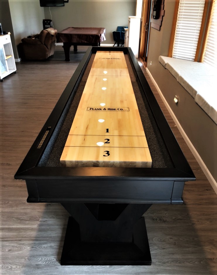 Transmotion Delivery Assembly Installation Relocation of a Plank And Hide 14' Gaston Shuffleboard in Gurnee IL Illinois Indiana Wisconsin Michigan California Washington Fun Family Friends Mancave America Game Gametable Party Basement